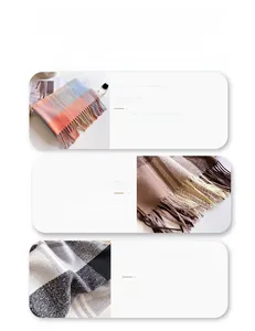 Close-up of wool rich plaid scarf texture with soft brushed fringe and luxury fabric detail