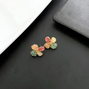 Elegant gold flower stud earrings with colorful handmade beaded petals in vintage style