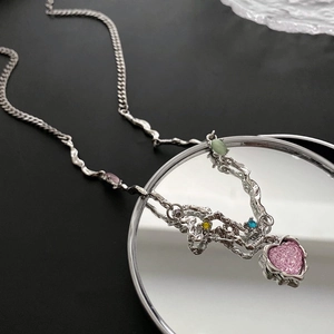Fashionable women's heart necklace with colorful stones and silver lava texture chain