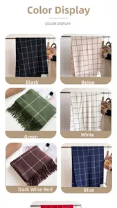 Detailed view of plaid scarves with fringe in various colors and soft cashmere-like texture