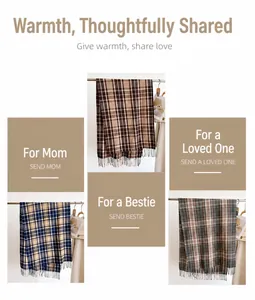 Detailed view of soft plaid cashmere-like scarves with fringe in three warm color schemes