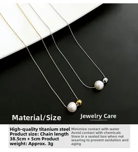Détail du collier de perles en acier titane montrant les dimensions 38,5 cm plus 5 cm d'extension