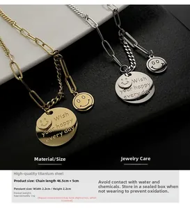 Close-up of titanium steel smiley face pendant with Wish Your Happy Every Day engraving