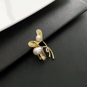 Elegant gold leaf brooch with white drop pearls and small rhinestones for sweaters