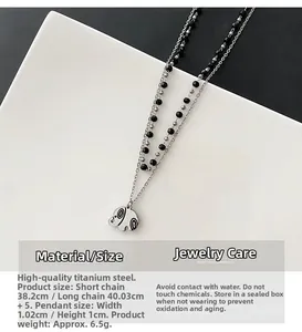 Detail of double-layer elephant pendant necklace in titanium steel with measurements