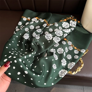 Dark green silk scarf with white rose patterns, polka dots and golden chain print