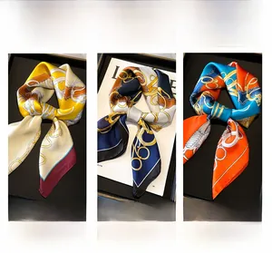 Detailed comparison of three silk scarves featuring equestrian chain patterns in various colors