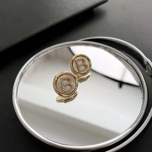 Elegant gold letter B stud earrings with zircon inlay and mother of pearl finish