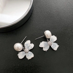 Elegant pearl flower earrings with blue crystal petals and silver finish for women