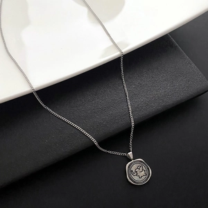 Vintage elephant coin pendant necklace in silver with classic cuban link chain