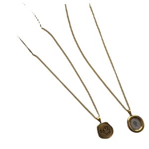 Gold layering necklaces with elephant coin pendant and vintage Elizabeth II coin charm