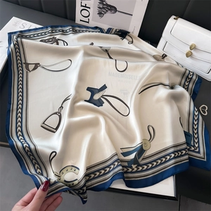 Elegant ivory silk scarf with equestrian horse motifs and navy geometric borders