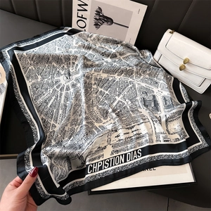 Silk-like 70cm square scarf with vintage map print and black border on leather background
