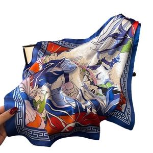 Floral print satin silk square scarf with geometric patterns and bright blue borders