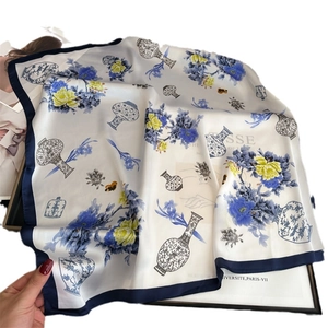 Elegant silk scarf with blue peony and porcelain pattern on white fabric base