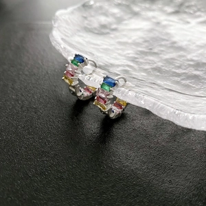 Chic silver hoop earrings featuring five vibrant rectangular zirconia in colorful palette