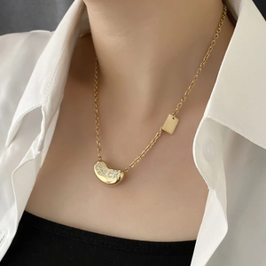 Minimalist gold bean necklace for women with LUCKY diamond pendant on delicate chain