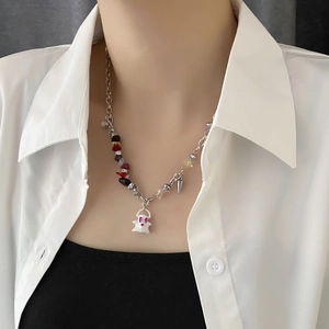 Ghost pendant necklace with colorful stones on female model for trendy street style