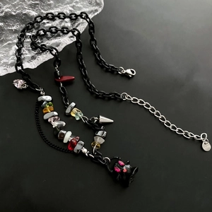 Ghost pendant necklace with colorful stones and black chain in luxury punk style