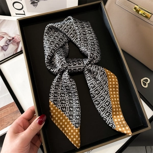 Luxurious faux silk twilly scarf with black and white geometric pattern in gift box