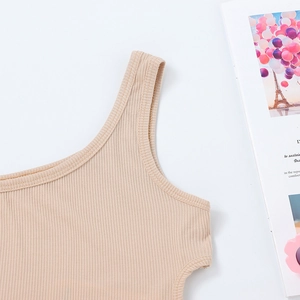 Detail view of ribbed knit texture and stitching on girls' one-shoulder tank top