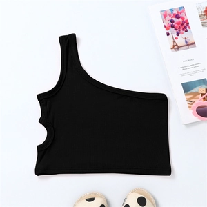 Macro view of black one-shoulder ribbed tank top with stylish waist cutout detail