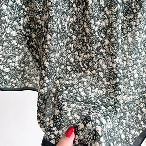 Macro detail of French floral square scarf showing vintage berry print and silky texture