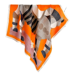 Vibrant orange silk scarf featuring elegant horse print and geometric patterns