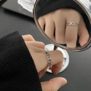 Minimalist silver heart-shaped hollow ring set in titanium steel for women