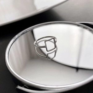 Minimalist square open-cut titanium steel ring with a polished silver mirror finish
