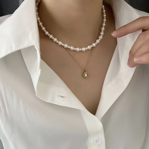Elegant double layered titanium steel necklace with imitation pearls and baroque pendant