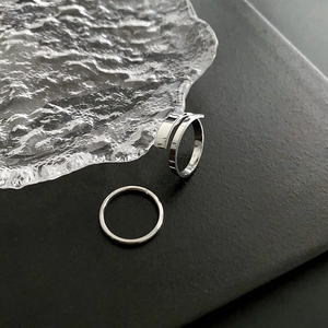 Titanium steel ring set with minimalist silver band and adjustable layered ring design