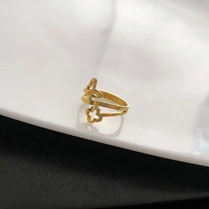 Adjustable gold plated titanium steel bypass ring with hollow four-leaf clover design