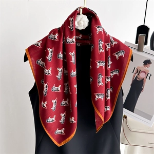 Elegant red square silk scarf with classic carriage print and orange rolled edges