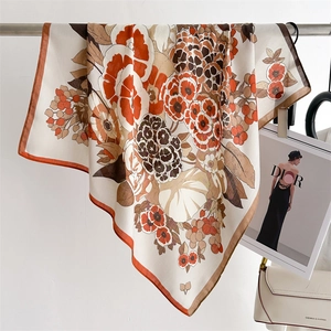 French retro floral square silk scarf with warm orange tones and elegant draping style