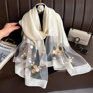 Elegant beige silk scarf featuring pink floral embroidery and sheer organza detailing
