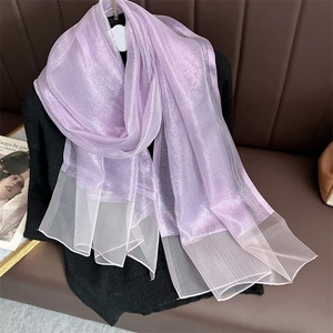 Detail showing lavender silk shawl texture and organza splicing on elegant scarf