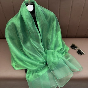 Bright green sheer silk scarf with metallic luster for women as a lightweight pashmina shawl