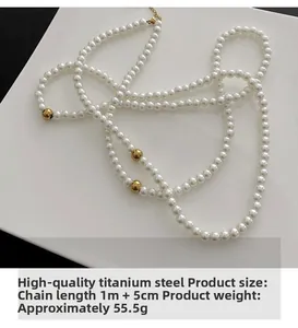 Detail of 1.2m multilayer faux pearl necklace with gold titanium steel beads