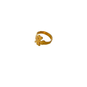 Polished gold clover ring for women made of durable stainless steel on white background