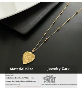 Macro shot of gold heart necklace with I Love You engraving and detailed dimensions