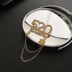 Elegante broche dorado 520 con circonitas brillantes y colgante de estrella