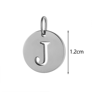 Detail view of 1.2cm stainless steel letter J round pendant with hollow design