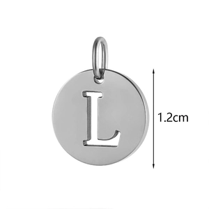 Detail shot of a 1.2cm stainless steel round pendant featuring a cutout letter L
