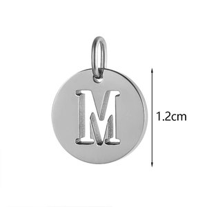Polished silver stainless steel letter M pendant with 1.2cm diameter cutout design