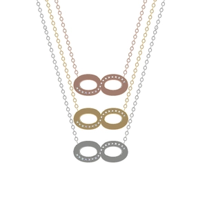 Detailed view of infinity pendant necklaces with crystal accents in gold, silver, and rose gold