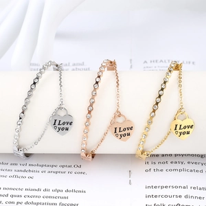 Three-piece stainless steel bracelet set with crystals and heart 'I Love You' pendants