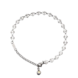 Silver stainless steel anklet featuring hollow heart links and a colorful crystal pendant