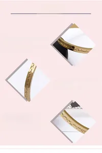 Detail of 18K gold plated heart rate EKG bangle with polished finish and engraving