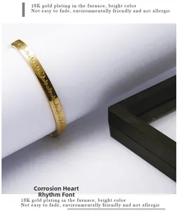 Detailed view of 18K gold plated heart rate pattern engraved on stainless steel bangle